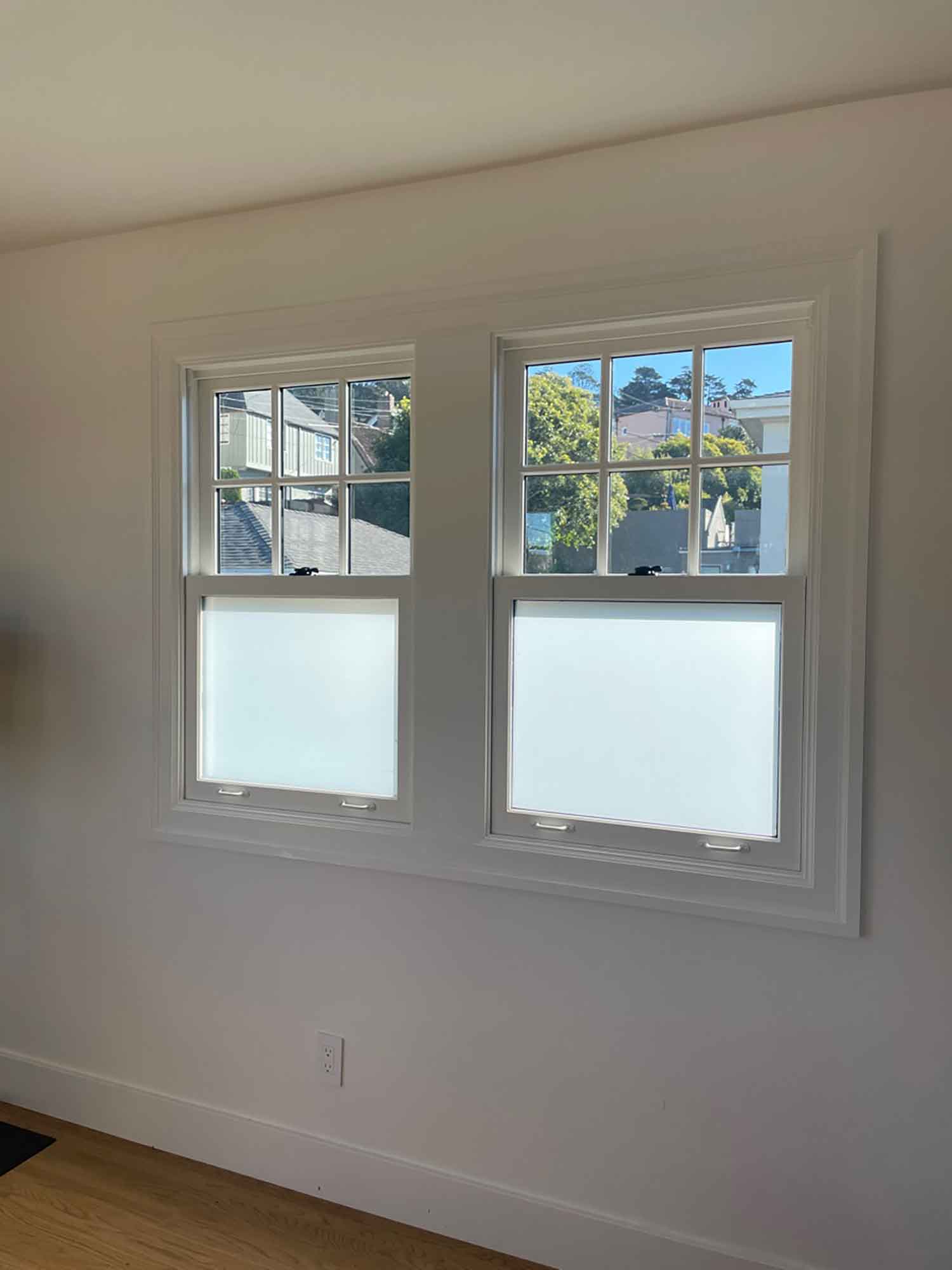 Frosted window tint from 3M gives this San Francisco home privacy and sunlight. Installed by ClimatePro.