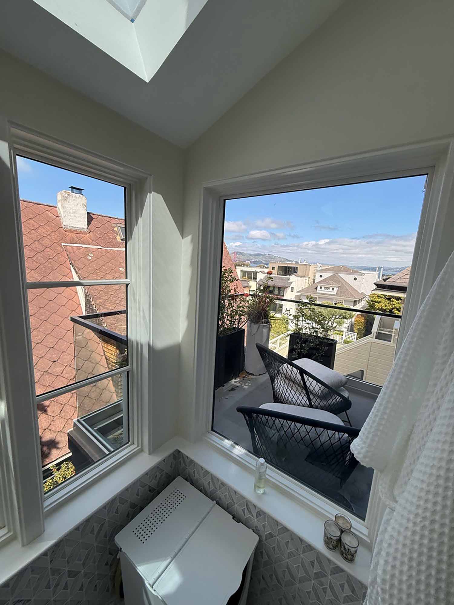 Combination of 3M Prestige 70 and Silver P-18 window film helping control glare, heat, and UV rays in a bright San Francisco bathroom.