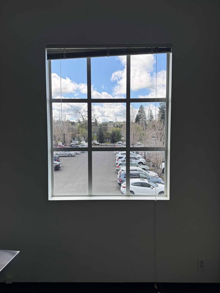 Large windows bring in natural light but can also create uncomfortable hot spots. ClimatePro installed 3M Prestige 70 to improve comfort throughout this office without replacing the existing glass or darkening the view.