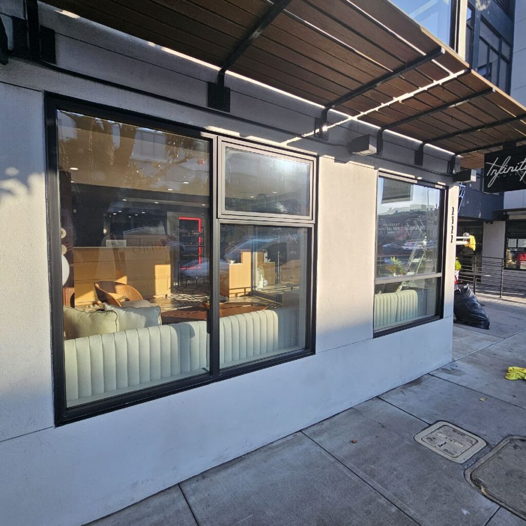 Street-facing hotel glass takes a lot of abuse. Anti-graffiti film creates a sacrificial layer that can be replaced if damaged, protecting the glass underneath and reducing maintenance costs.