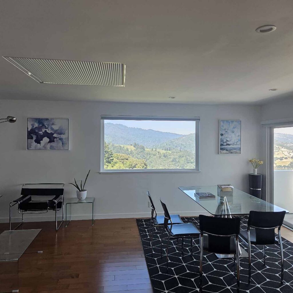 3M Prestige Sun Control Window Film provides UV protection and solar control without replacing the existing glass or changing the home's open, modern appearance.