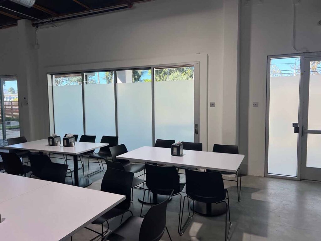Commercial privacy window film is a practical alternative to blinds, offering permanent privacy with a clean, low-maintenance appearance.
