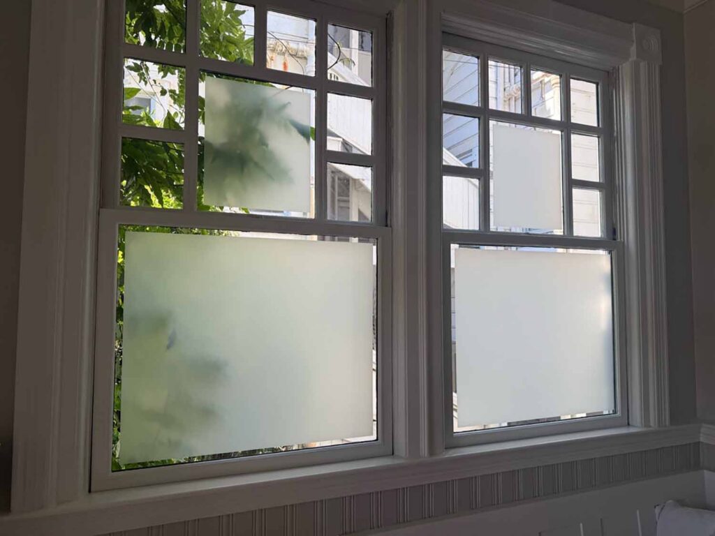 Privacy film helps make this room more comfortable without relying on closed blinds or curtains